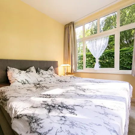 Апартаменты Ostseepark Captains Haus 12 *